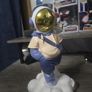 Gold-Visor Astronaut Figurine in Lavender and Cream